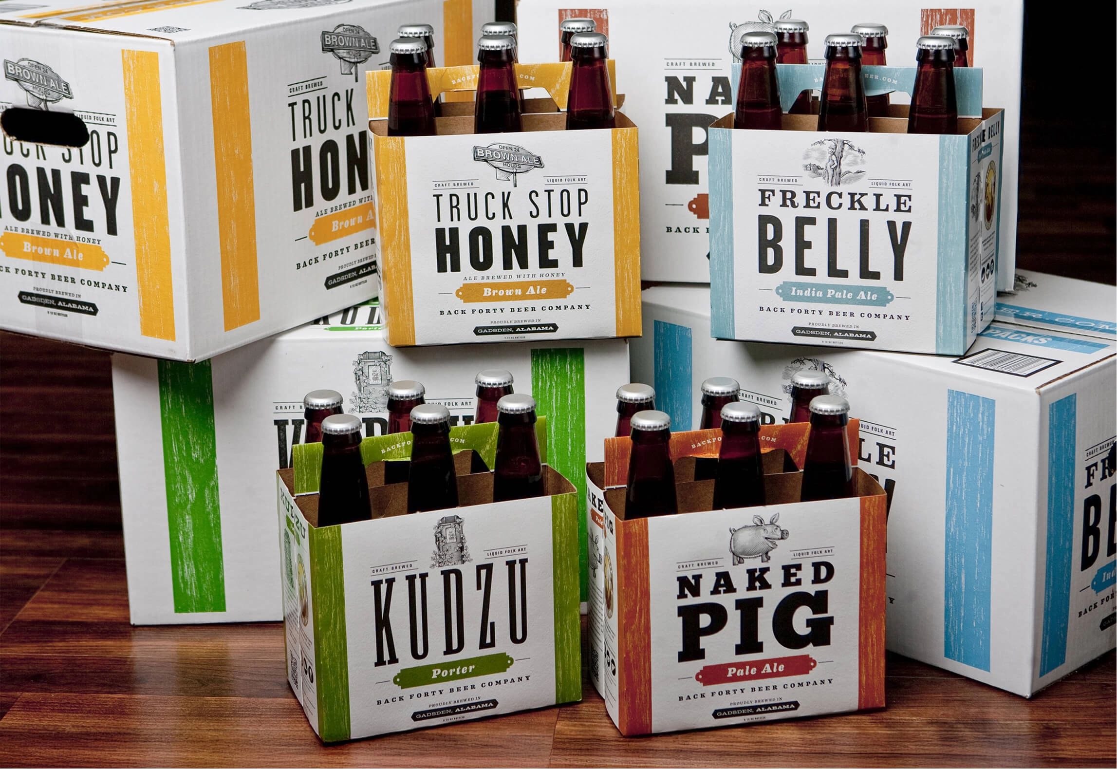 Back Forty packaging stacked on a hardwood floor