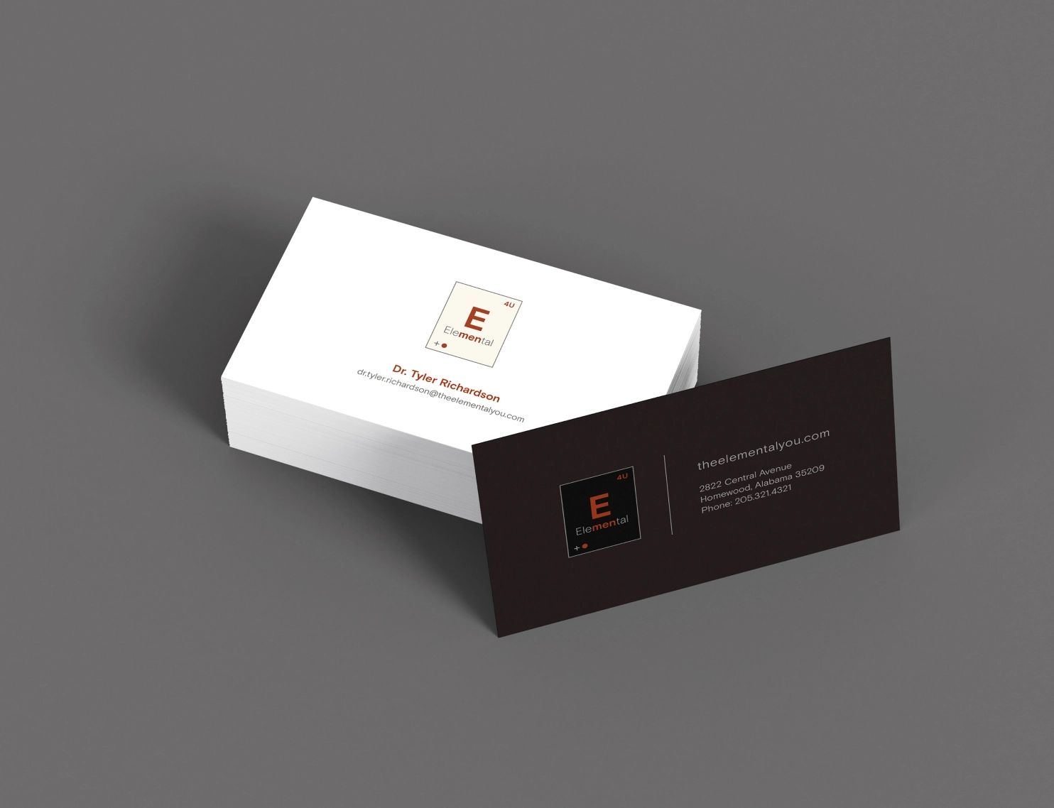 A close shot of an Elemental business card layout front and back