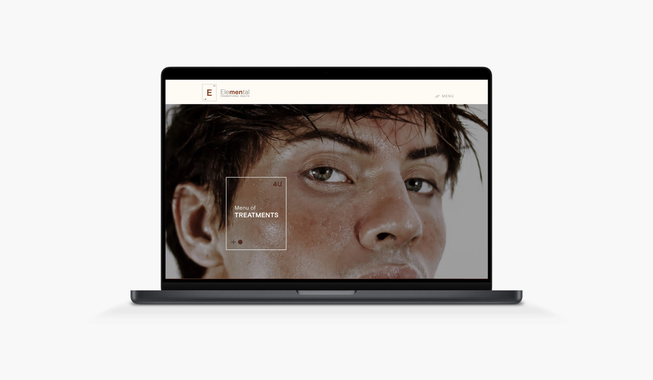 A laptop displaying the Elemental website