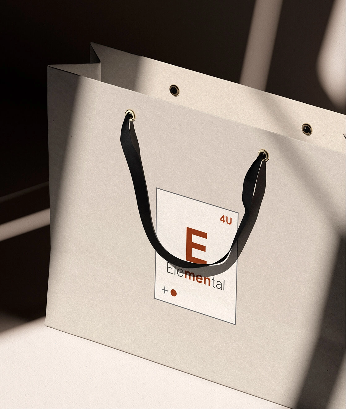 A tote bag with the Elemental logo on it